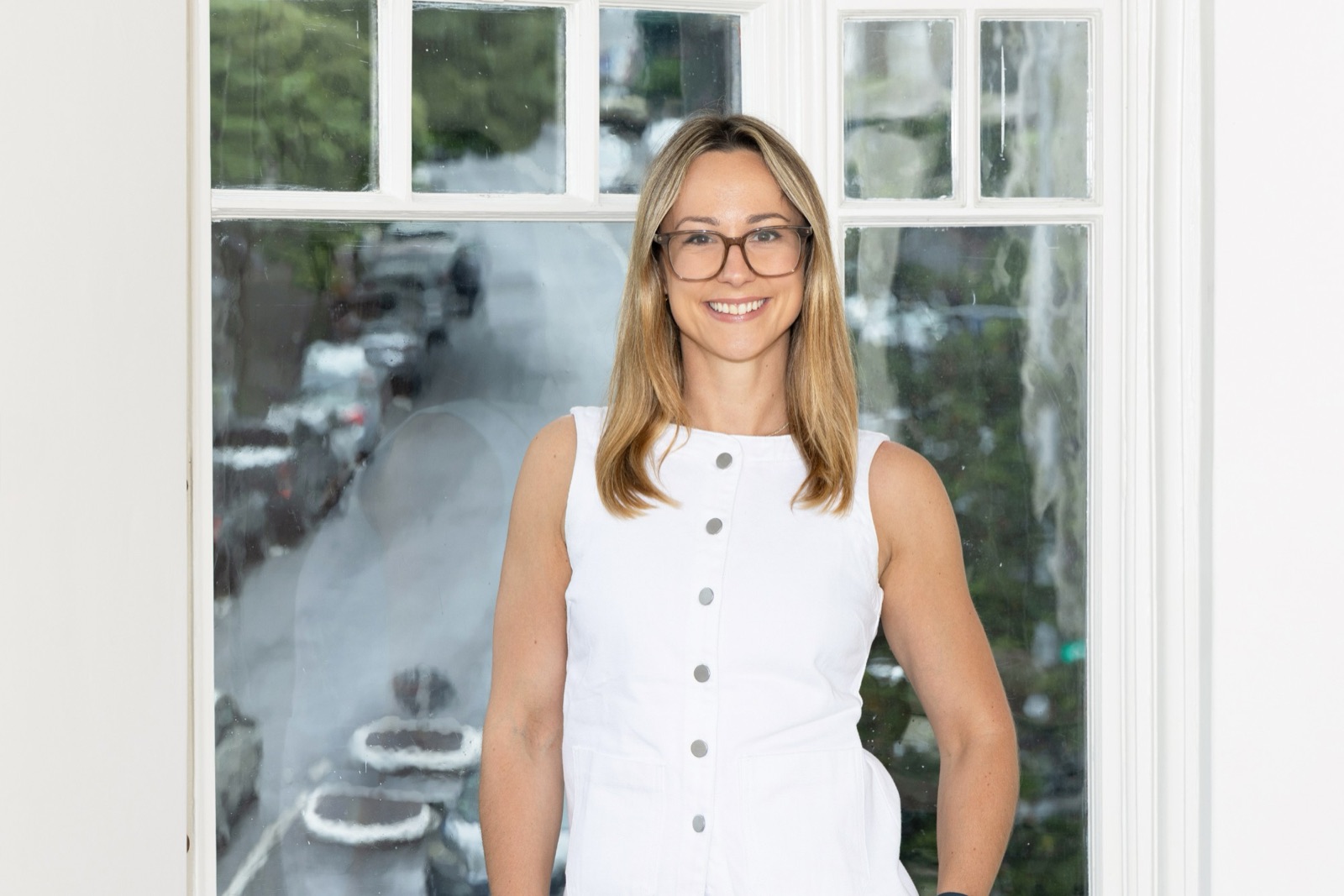 Corinna Stukan in front of a window