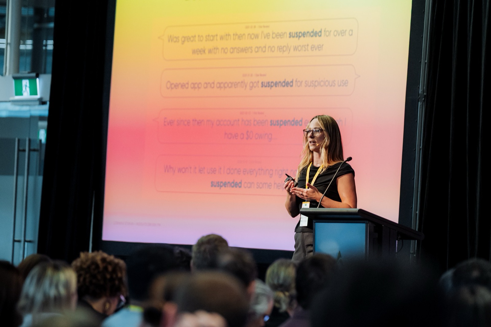 Corinna presenting customer quotes on a large screen